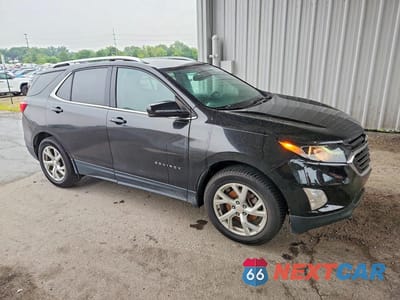 Czwarte zdjęcie samochodu z boku: 2020 CHEVROLET EQUINOX LT VIN:2GNAXVEX4L6251657 - miniatura
