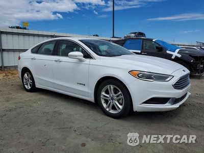 Czwarte zdjęcie samochodu z boku: 2018 FORD FUSION SE HYBRID VIN:3FA6P0LU7JR171548 - miniatura