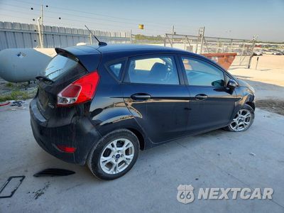 Trzecie zdjęcie samochodu z tyłu: 2014 FORD FIESTA SE VIN:3FADP4EJXEM177008 - miniatura