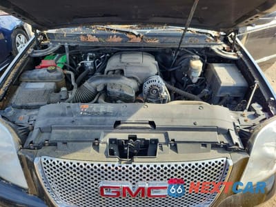 Zdjęcie 12 z 13 samochodu: 2012 GMC YUKON DENALI VIN:1GKS2EEF7CR297236 - miniatura