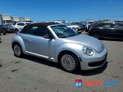 Czwarte zdjęcie samochodu z boku: 2014 VOLKSWAGEN BEETLE VIN:3VW507AT1EM821715 - miniatura