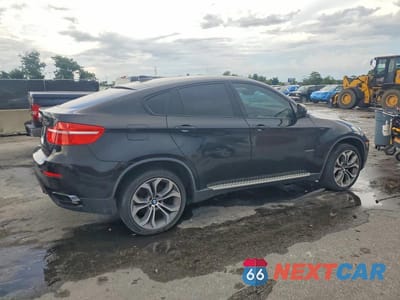 Trzecie zdjęcie samochodu z tyłu: 2012 BMW X6 XDRIVE50I VIN:5UXFG8C58CL590834 - miniatura