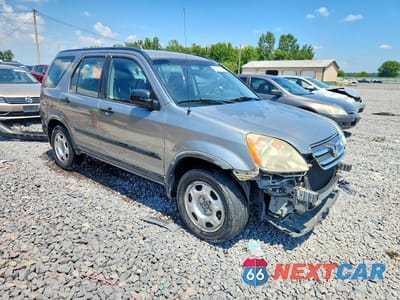 Czwarte zdjęcie samochodu z boku: 2006 HONDA CR-V LX VIN:JHLRD68586C021719 - miniatura
