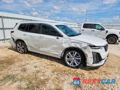 Czwarte zdjęcie samochodu z boku: 2024 CADILLAC XT6 PREMIUM LUXURY VIN:1GYKPCRS7RZ719288 - miniatura