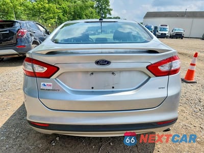 Zdjęcie 6 z 12 samochodu: 2014 FORD FUSION SE VIN:1FA6P0H70E5401703 - miniatura