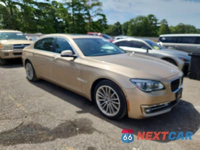 Czwarte zdjęcie samochodu z boku: 2014 BMW 750 LI VIN:WBAYE8C54ED136476 - miniatura