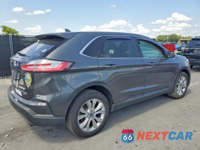 Trzecie zdjęcie samochodu z tyłu: 2020 FORD EDGE TITANIUM VIN:2FMPK4K96LBA60150 - miniatura