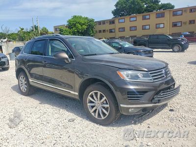 Czwarte zdjęcie samochodu z boku: 2016 VOLKSWAGEN TOUAREG SPORT VIN:WVGEF9BP6GD012901 - miniatura