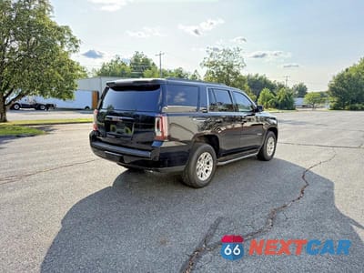 Czwarte zdjęcie samochodu z boku: 2015 GMC YUKON SLT VIN:1GKS2BKC7FR192922 - miniatura