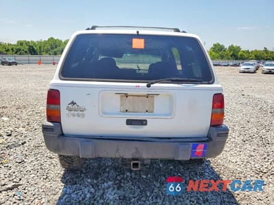 Zdjęcie 6 z 14 samochodu: 1995 JEEP GRAND CHEROKEE LAREDO VIN:1J4FX58S5SC640032 - miniatura