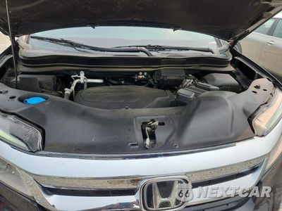 Zdjęcie 12 z 13 samochodu: 2021 HONDA PILOT ELITE VIN:5FNYF6H04MB032773 - miniatura