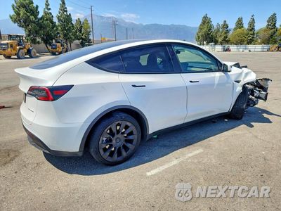 Trzecie zdjęcie samochodu z tyłu: 2023 TESLA MODEL Y VIN:7SAYGAEE6PF697231 - miniatura