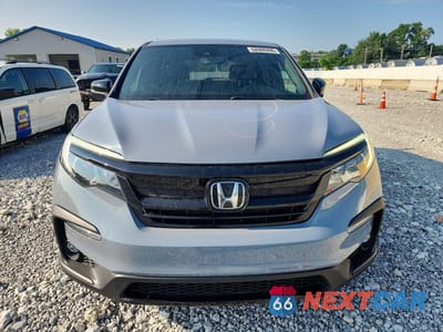 Piąte zdjęcie samochodu w środku: 2022 HONDA PILOT TRAILSPORT VIN:5FNYF6H81NB102236 - miniatura