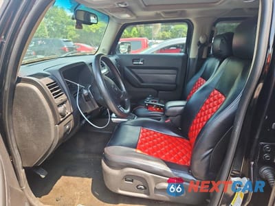 Zdjęcie 7 z 12 samochodu: 2009 HUMMER H3 VIN:5GTEN13E898113271 - miniatura