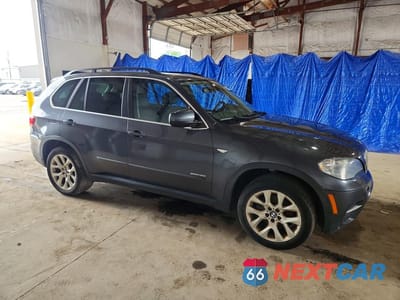 Czwarte zdjęcie samochodu z boku: 2013 BMW X5 XDRIVE35I VIN:5UXZV4C52D0B23149 - miniatura