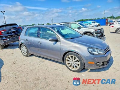 Czwarte zdjęcie samochodu z boku: 2012 VOLKSWAGEN GOLF VIN:WVWDM7AJ1CW188793 - miniatura