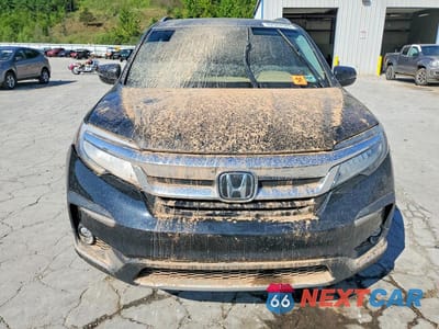 Piąte zdjęcie samochodu w środku: 2022 HONDA PILOT ELITE VIN:5FNYF6H03NB042874 - miniatura