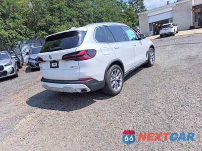 Czwarte zdjęcie samochodu z boku: 2026 BMW X5 XDRIVE40I VIN:5UX23EU09T9342584 - miniatura