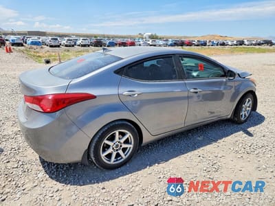 Trzecie zdjęcie samochodu z tyłu: 2013 HYUNDAI ELANTRA GLS VIN:KMHDH4AE4DU972495 - miniatura