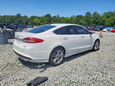 Trzecie zdjęcie samochodu z tyłu: 2018 FORD FUSION SE HYBRID VIN:3FA6P0LU0JR278702 - miniatura