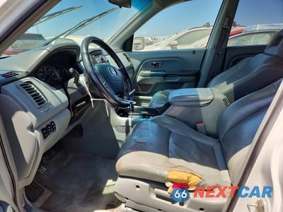 Zdjęcie 7 z 13 samochodu: 2005 HONDA PILOT EXL VIN:5FNYF18585B039385 - miniatura