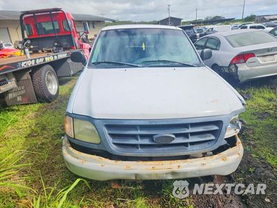 Piąte zdjęcie samochodu w środku: 2000 FORD F150 VIN:1FTZX1727YKB02038 - miniatura