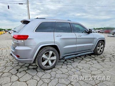 Trzecie zdjęcie samochodu z tyłu: 2014 JEEP GRAND CHEROKEE OVERLAND VIN:1C4RJFCG4EC233028 - miniatura