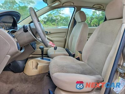 Zdjęcie 7 z 12 samochodu: 2004 FORD FOCUS SE COMFORT VIN:1FAFP34364W136086 - miniatura