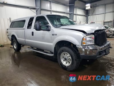 Czwarte zdjęcie samochodu z boku: 1999 FORD F250 SUPER DUTY VIN:1FTNX21F9XEC84600 - miniatura