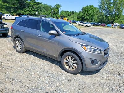Czwarte zdjęcie samochodu z boku: 2017 KIA SORENTO LX V6 VIN:5XYPGDA57HG210967 - miniatura