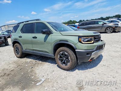 Czwarte zdjęcie samochodu z boku: 2026 HONDA PASSPORT TRAILSPORT ELITE VIN:5FNYF9H8XTB052497 - miniatura