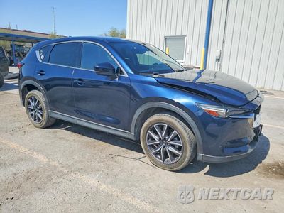 Czwarte zdjęcie samochodu z boku: 2017 MAZDA CX-5 GRAND TOURING VIN:JM3KFADL9H0168935 - miniatura