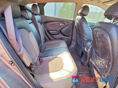 Zdjęcie 11 z 14 samochodu: 2011 HYUNDAI TUCSON GLS VIN:KM8JU3AC2BU171147 - miniatura
