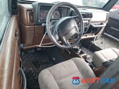 Zdjęcie 8 z 12 samochodu: 2003 JEEP WRANGLER / TJ SPORT VIN:1J4FA49S63P361743 - miniatura
