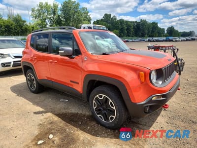 Czwarte zdjęcie samochodu z boku: 2015 JEEP RENEGADE TRAILHAWK VIN:ZACCJBCT1FPC03753 - miniatura