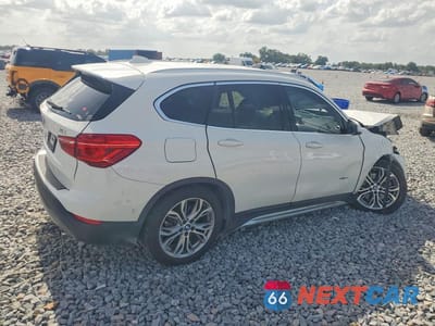 Trzecie zdjęcie samochodu z tyłu: 2017 BMW X1 XDRIVE28I VIN:WBXHT3C36H5F73989 - miniatura