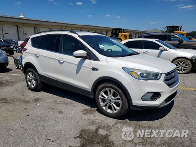 Czwarte zdjęcie samochodu z boku: 2017 FORD ESCAPE SE VIN:1FMCU9G94HUA25929 - miniatura