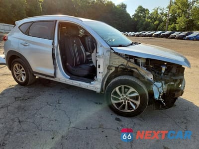 Czwarte zdjęcie samochodu z boku: 2018 HYUNDAI TUCSON SEL VIN:KM8J33A43JU713799 - miniatura