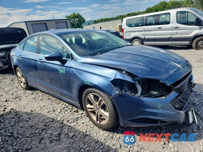 Czwarte zdjęcie samochodu z boku: 2018 FORD FUSION SE VIN:3FA6P0HD0JR174199 - miniatura