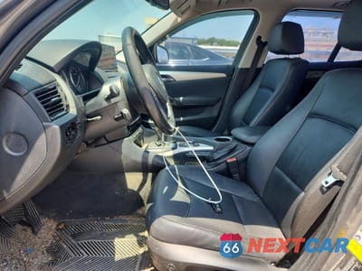 Zdjęcie 7 z 12 samochodu: 2013 BMW X1 SDRIVE28I VIN:WBAVM1C52DVW44810 - miniatura