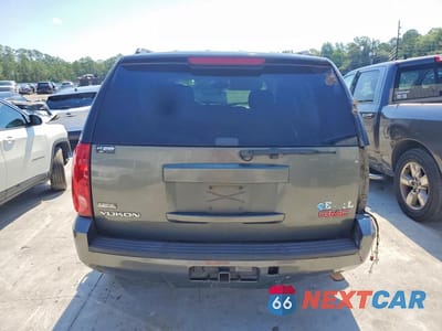 Zdjęcie 6 z 13 samochodu: 2011 GMC YUKON SLE VIN:1GKS1AE01BR164820 - miniatura