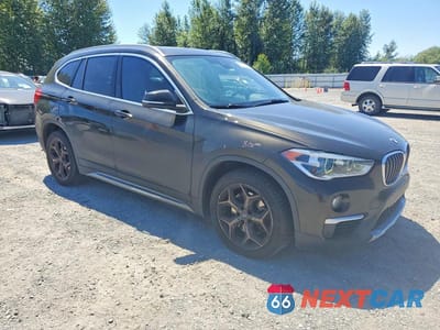 Czwarte zdjęcie samochodu z boku: 2018 BMW X1 XDRIVE28I VIN:WBXHT3C3XJ3H30621 - miniatura