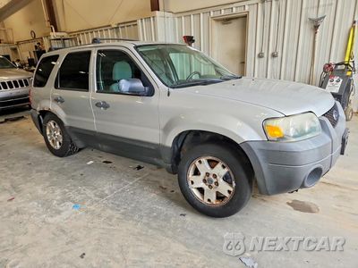 Czwarte zdjęcie samochodu z boku: 2007 FORD ESCAPE XLT VIN:1FMYU93167KA18769 - miniatura