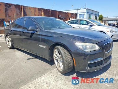 Czwarte zdjęcie samochodu z boku: 2013 BMW 750 I VIN:WBAYA8C59DC996616 - miniatura