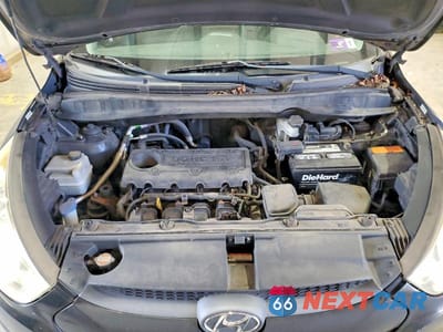 Zdjęcie 12 z 13 samochodu: 2012 HYUNDAI TUCSON GLS VIN:KM8JU3AC3CU435834 - miniatura