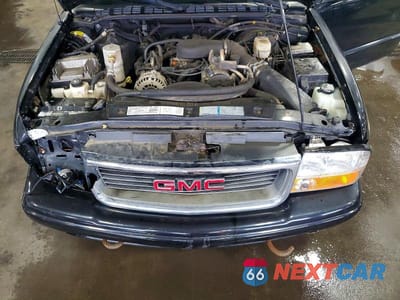 Zdjęcie 11 z 12 samochodu: 2002 GMC SONOMA VIN:1GTDT19W928117344 - miniatura