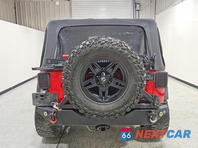Zdjęcie 6 z 12 samochodu: 2011 JEEP WRANGLER SPORT VIN:1J4AA2D1XBL544369 - miniatura