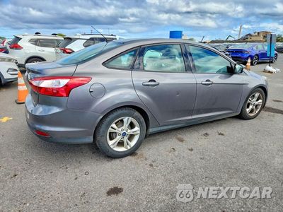 Trzecie zdjęcie samochodu z tyłu: 2014 FORD FOCUS SE VIN:1FADP3F28EL227908 - miniatura