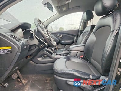 Zdjęcie 7 z 14 samochodu: 2010 HYUNDAI TUCSON GLS VIN:KM8JUCAC3AU084520 - miniatura