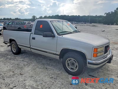 Czwarte zdjęcie samochodu z boku: 1997 GMC SIERRA C1500 VIN:1GTEC14M7VZ512017 - miniatura